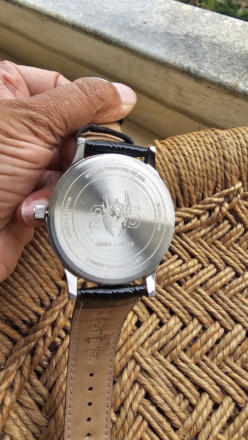 Caseback engraving: WE RIDE THEREFORE WE ARE · MORTALITY · BANGALORE · 2001-2026 · CARNIVALESQUE ATTIREMENT